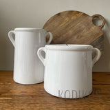 white ceramic utensil pots rustic kitchen