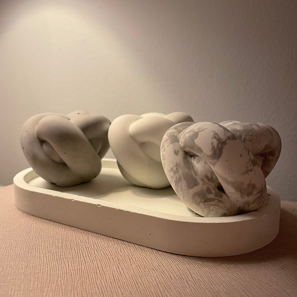 Grey, white and marble concrete knot ornaments