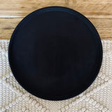 Black round concrete tray