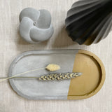 Gold and grey concrete oval trinket tray