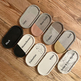 Selection of all of our oval concrete trays from birds eye view with colour labels