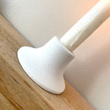 small white candlestick holder