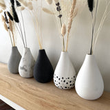 Our 5 rounded tear drop shape concrete bud vases. Scandi vase